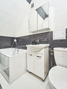 Kúpeľňa v ubytovaní Apartament Dwupoziomowy Pardałówka + 22 fotografií