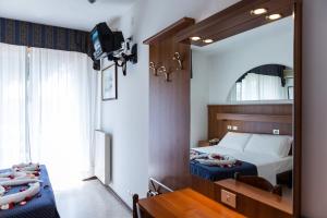 A bed or beds in a room at Hotel Vina De Mar
