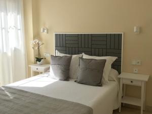 Posteľ alebo postele v izbe v ubytovaní Sunandsea apartment + 23 fotografií