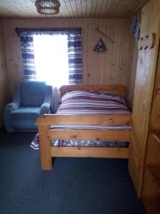 Ein Bett oder Betten in einem Zimmer der Unterkunft Edelveys