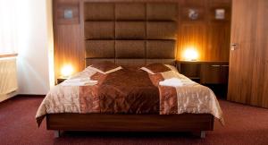 Posteľ alebo postele v izbe v ubytovaní Garni Hotel Branc