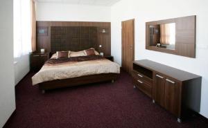 Postel nebo postele na pokoji v ubytování Hotel Branč, Garni