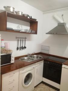 A kitchen or kitchenette at Covaleda naturazleza y relax