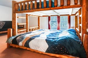 a bedroom with a wooden bunk bed in a room at Mount Royal Townhome in Frisco