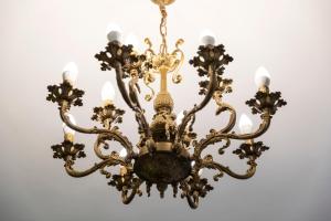 a chandelier hanging from a ceiling at Charlino Plaza in Ruse