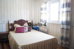 Imagen de la galería de Casa com 4 quartos à 200 m da praia c/ churrasqueira, en Palhoça