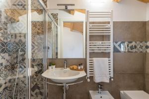 Ett badrum på Il Baiocco