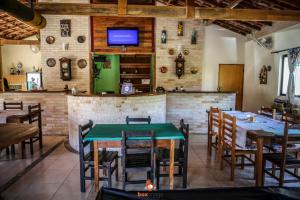 Um restaurante ou outro lugar para comer em Pousada Encantos da Serra
