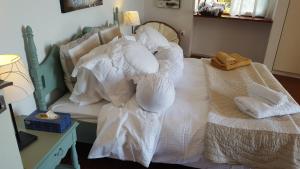 A bed or beds in a room at Seafront Villa Aggeliki