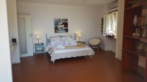 A bed or beds in a room at Seafront Villa Aggeliki
