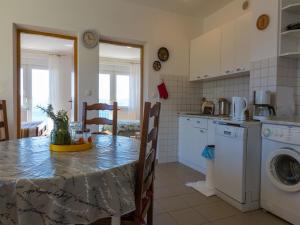 Kuchyň nebo kuchyňský kout v ubytování Apartments STIPE