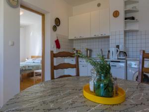 Kuchyň nebo kuchyňský kout v ubytování Apartments STIPE