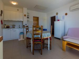 Kuchyň nebo kuchyňský kout v ubytování Apartments STIPE