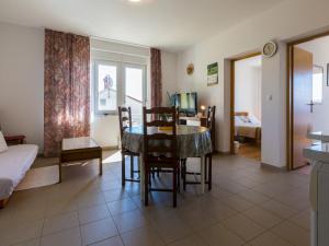 Postel nebo postele na pokoji v ubytování Apartments STIPE