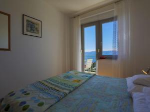 Postel nebo postele na pokoji v ubytování Apartments STIPE