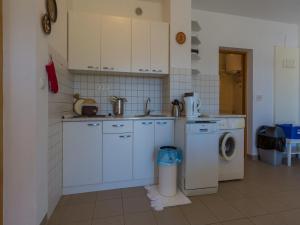 Kuchyň nebo kuchyňský kout v ubytování Apartments STIPE