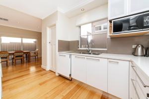 A kitchen or kitchenette at Inner Western Suburbs Retreat