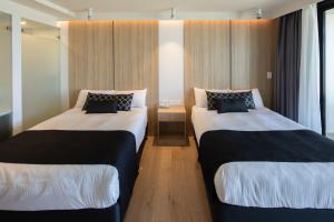 Postel nebo postele na pokoji v ubytování Ocean Front Motel