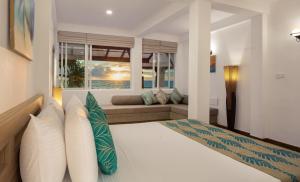 Villa Mer Vue客房内的一张或多张床位