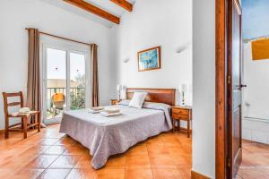 A bed or beds in a room at Villa Fuegosol