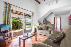 A television and/or entertainment centre at Villa Fuegosol