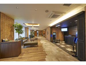Sotetsu Fresa Inn Kamakura-Ofuna Higashiguchi的电视和/或娱乐中心