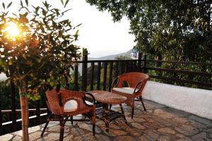 A balcony or terrace at BLUE GREY cottage