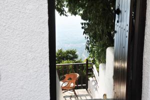 A balcony or terrace at BLUE GREY cottage