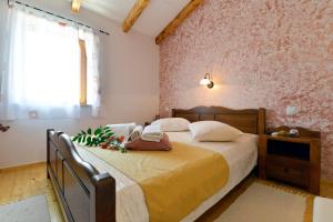 Katil atau katil-katil dalam bilik di Bed and Breakfast Casa Rustica +70 gambar