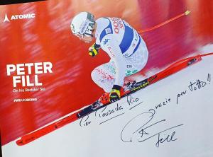un póster de un esquiador bajando por una pendiente en B&B Pousada Rio Aosta-servizi di Bed and breakfast, en Aosta