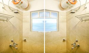 Koupelna v ubytování Treebo Luxe Suite, Shivaji Nagar