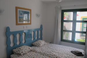 Posteľ alebo postele v izbe v ubytovaní Harbour n 233 Playa de Mogan by El Sirocco