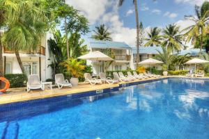 Het zwembad bij of vlak bij Cocotiers Hotel – Mauritius