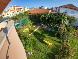 an overhead view of a yard with chairs and trees at Apartments Villa Rotim in Zadar
