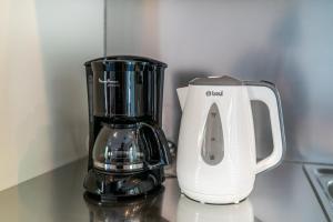 Oprema za pripravo čaja oz. kave v nastanitvi Residence AIRONE