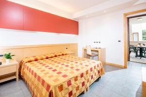 Posteľ alebo postele v izbe v ubytovaní Residence AIRONE + 16 fotografií