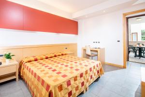 Postel nebo postele na pokoji v ubytování Residence AIRONE