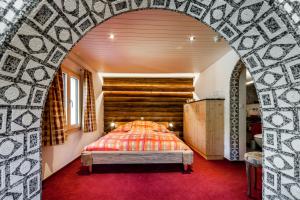 Ένα ή περισσότερα κρεβάτια σε δωμάτιο στο Hotel Gspan