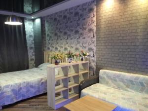 Katil atau katil-katil dalam bilik di Apartment on Yuvilejnyj avenue