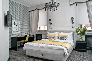 Кровать или кровати в номере Дизайн Отель Софит