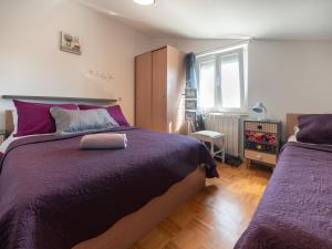 Postel nebo postele na pokoji v ubytování Apartments Zaton + 37 fotografií