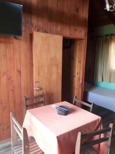 a dining room table with a bowl on top of it at Proa Amarilla in Punta del Este