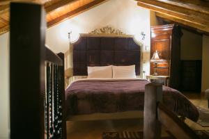 Postel nebo postele na pokoji v ubytování Montecristo Chalet + 115 fotografií