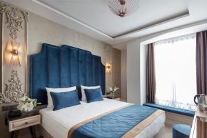 Un ou plusieurs lits dans un hébergement de l'établissement Danis Hotel & Spa Istanbul - Old City