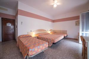 Postel nebo postele na pokoji v ubytování B&B Moresco