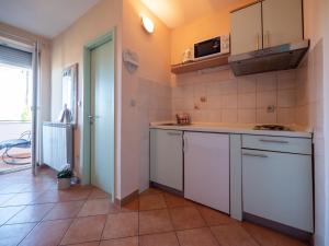 Kuchyň nebo kuchyňský kout v ubytování Apartments Zaton