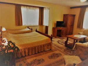 Imagen de la galería de Boyadjiyski Guest House, en Bansko