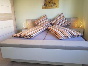 מיטה או מיטות בחדר ב-Jules Traum im Schwarzwald