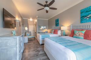 Cama ou camas em um quarto em Sea Breeze Beach House All Inclusive by Ocean Hotels
