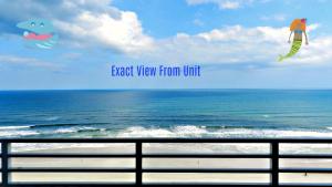 a view of the ocean with two kites flying in the sky at Wyndham Ocean Walk 2 BR Resort Condo Direct Oceanfront - Daytona Funland 22260 in Daytona Beach +65 photos